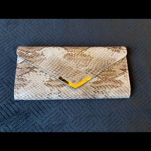 Snake print clutch